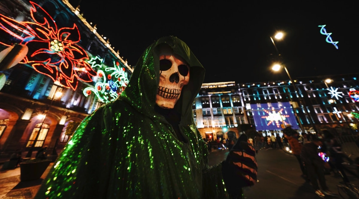 MARCOS PRETEND TO DANCE WITH HALLOWEEN SKELETON 