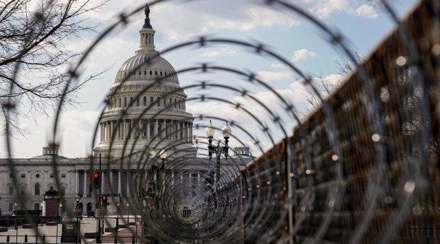 The US Capitol is seen through razor wire in Washington, U.S., March 4, 2021. (Reuters/Joshua Roberts/File Photo)