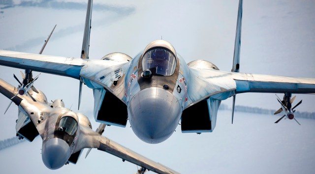 File photo released by the Russian Defense Ministry Press Service, a pair of Russian Su-35 fighter jets fly in the sky in Russia. The amassing of Russian troops and equipment near Ukraine's border has caused worries in Kyiv and in the West that Moscow could be planning to launch an invasion. (AP)