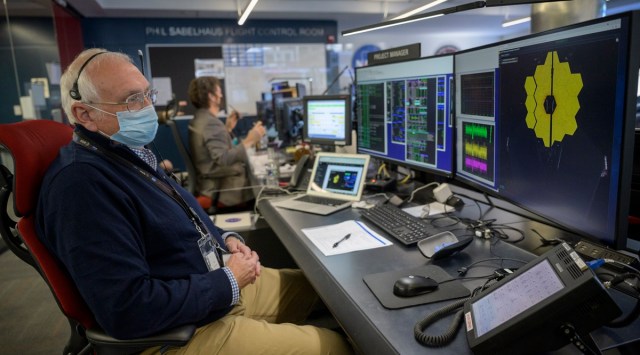 NASA James Webb Space Telescope Project Manager Bill Ochs monitors the progress of the observatory's second primary mirror wing as it rotates into position, Saturday, Jan. 8, 2022, from NASA's James Webb Space Telescope Mission Operations Center at the Space Telescope Science Institute in Baltimore. (AP)