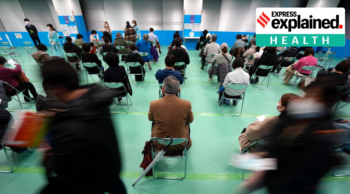 Medical workers, who received their third dose, rest at a vaccination centre in Japan, Thursday, Jan. 6, 2022. (AP Photo/Eugene Hoshiko)
