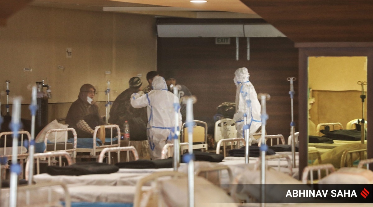 Covid patients at Sehnai Banquet Hall at the Covid Care Center in New Delhi. ( Express photo by Abhinav Saha)
