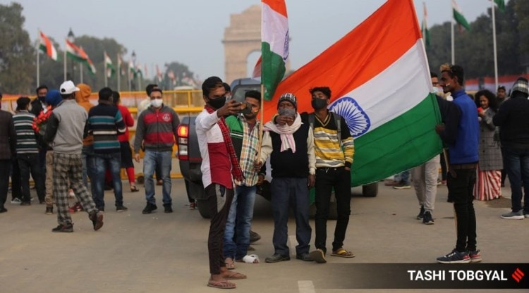 People celebrate Republic Day in Delhi while wearing face masks. (Express Photo: Tashi Tobgyal)