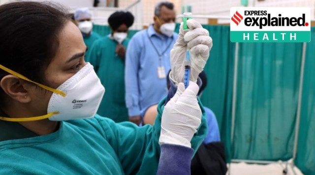 Booster doses are administered at Dayanand Medical College & Hospital in Ludhiana on Monday (Express Photo: Gurmeet Singh)