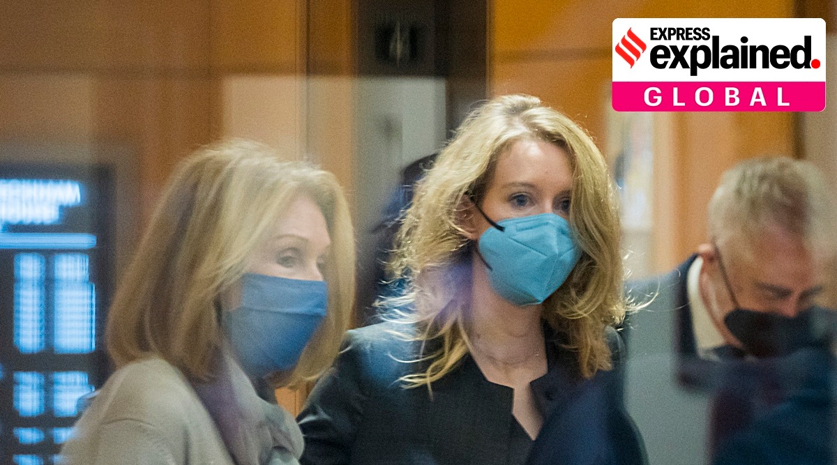 Elizabeth Holmes, center, enters federal court in San Jose, Calif., Monday, Jan. 3, 2022. (AP)