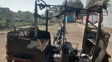 An auto rickshaw inside one of the houses was destroyed.
