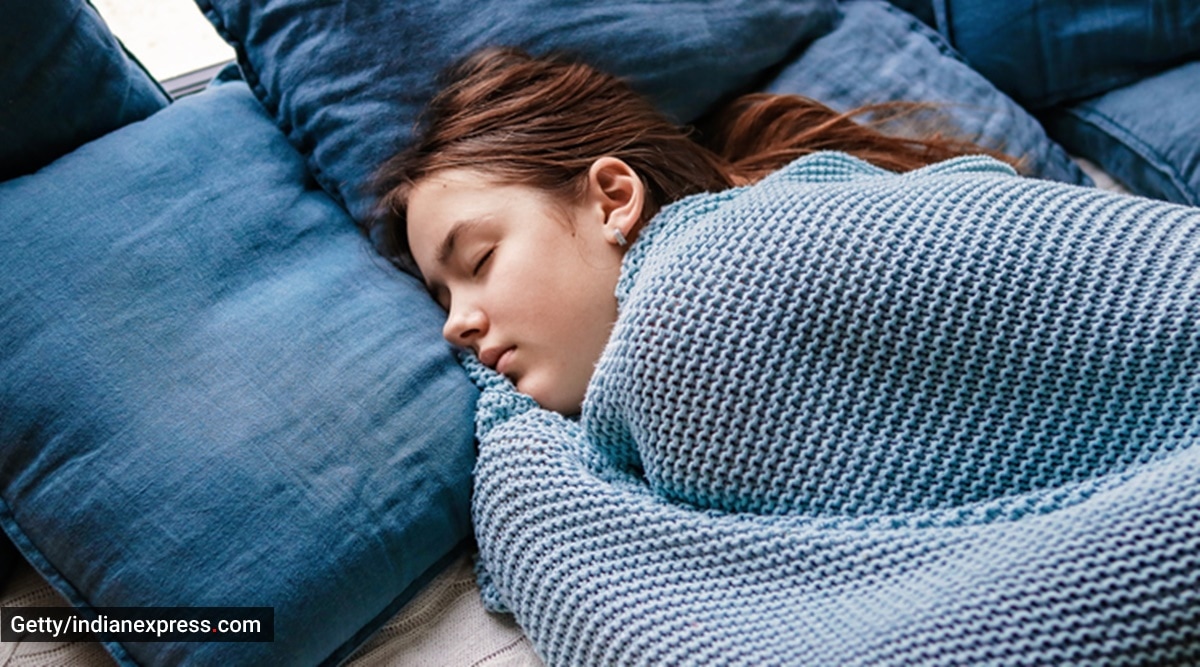 Premium Photo  Young woman in short shorts sleeps in bed without blanket  when lights are on