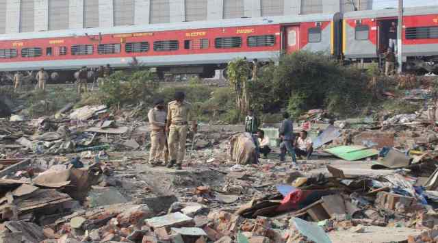 Demolition drive on an illegal encroachment near Surat Railway station Tuesday. (Express Photo by Hanif Malek)