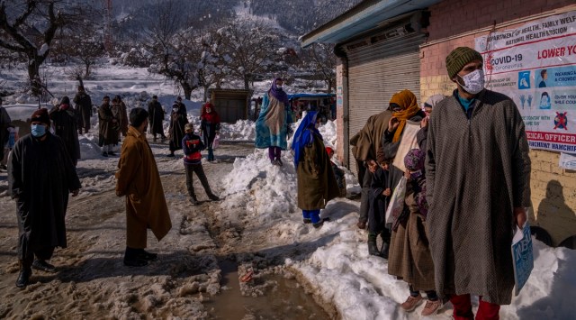 Villagers wait to get themselves registered for Covid-19 tests Budgam area, southwest of Srinagar, in Kashmir. (Photo: AP)
