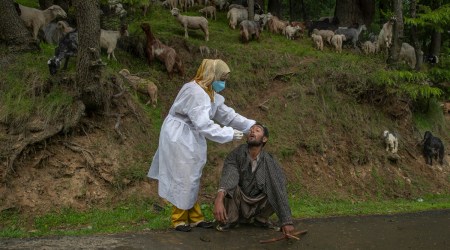 A doctor takes a swab sample in Budgam, Srinagar. (File Photo/AP)