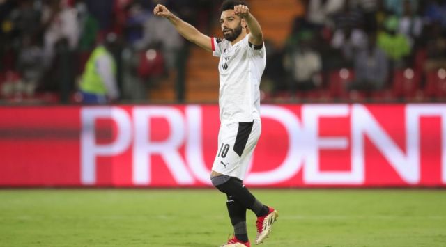 Egypt's Mohamed Salah celebrates after scoring in the African Cup of Nations Group D soccer match against Guinea-Bissau in Garoua, Cameroon. (AP)
