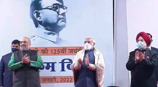 Prime Minister Narendra Modi unveils a hologram statue of Netaji Subhas Chandra Bose on 'Parakram Diwas', at a programme in New Delhi, Sunday, Jan. 23, 2022. Union Ministers Amit Shah and Hardeep Singh Puri are also seen. (PTI Photo)
