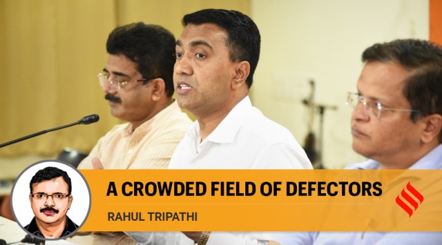 Goa Chief Minister Pramod Sawant (C) with Goa BJP president Sadanand Shet Tanavade (L) and NRI Commissioner Narendra Sawaikar, address a press conference after the ECI announced schedule of Goa Assembly elections, in Panaji, Saturday, Jan. 8, 2022. (PTI Photo)