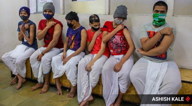Children aged between 15 and 18 receive Covid-19 vaccines in Pune. (Express Photo: Ashish Kale)
