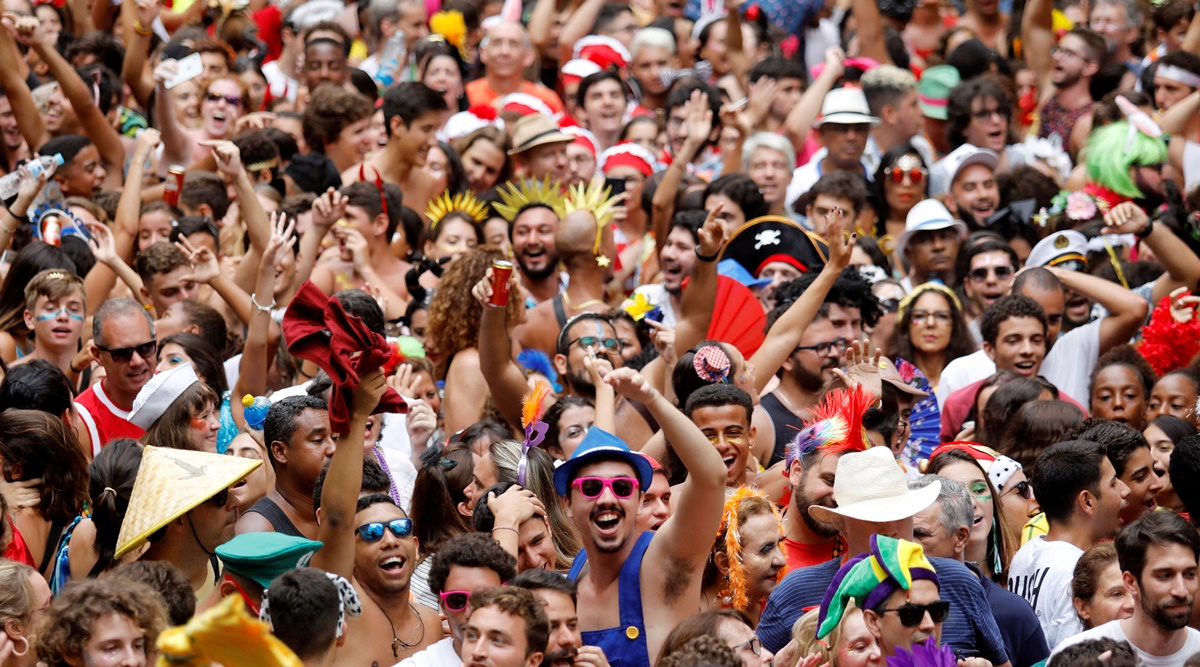 FILE PHOTO: Revellers take part in the annual block party known as "Laranjada" during Carnival festivities in Rio de Janeiro