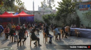 As Covid-19 cases surge, teens, frontline workers line up for jabs