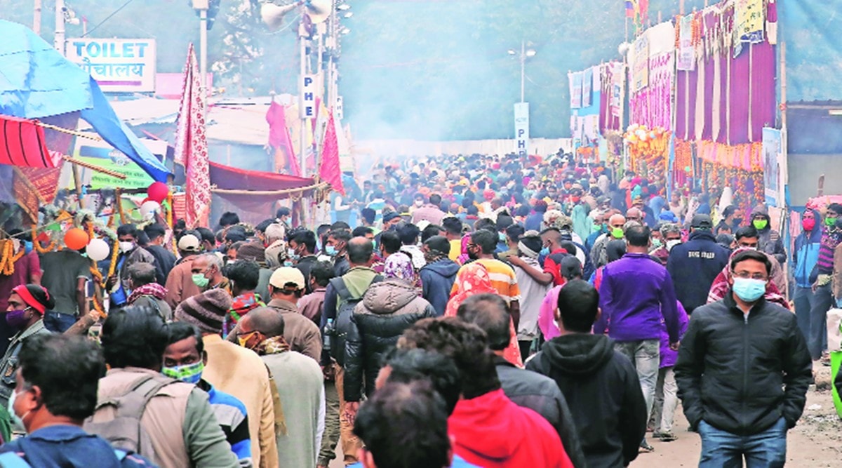 Pilgrims and visitors at Gangasagar Mela in Sagar Island on Wednesday. (Express Photo by Partha Paul)