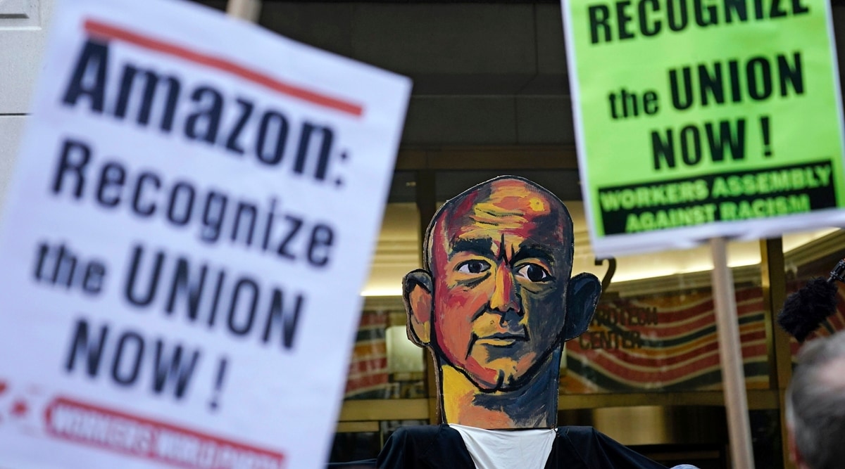 Activists rally outside while others deliver "Authorisation of Representation" forms to the National Labour Relations Board in New York, Oct 25, 2021. (File, AP)