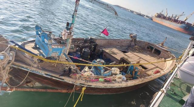 The Pakistani fishing boat apprehended by Indian Coast, anchored in Porbandar harbour, in Porbandar on Monday. (Express photo) 