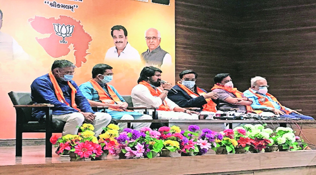Vijay Suvada after joining the BJP at Shree Kamalam office in Gandhinagar on Monday. Express photo