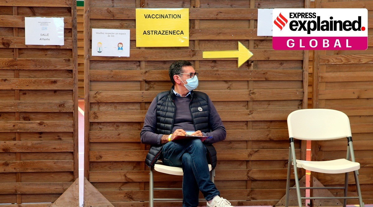 A man waits to get vaccinated with the Astrazeneca COVID19 vaccine in a vaccination center of Saint-Jean-de-Luz, southwestern France. (AP Photo/Bob Edme)