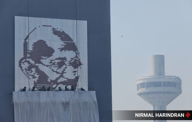 The Khadi and Village Industries Commission (KVIC) erected the artwork on a wall along the Sabarmati riverbank. (Express Photo)