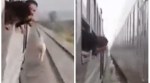 horse running between two trains, horse video, horse running, viral video, indian express