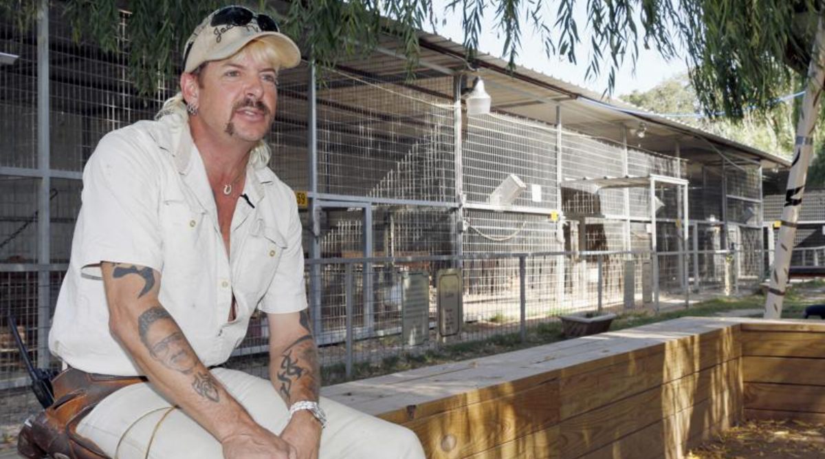 In this Aug. 28, 2013, file photo, Joseph Maldonado answers a question during an interview at the zoo he runs in Wynnewood, Okla. Maldonado known also as “Tiger King” Joe Exotic is headed to a federal courtroom Friday, Jan. 28, 2022, for a resentencing hearing. He's now in federal prison after a jury convicted him in a murder-for-hire plot involving his chief rival, Carole Baskin. (AP Photo/Sue Ogrocki, File)
