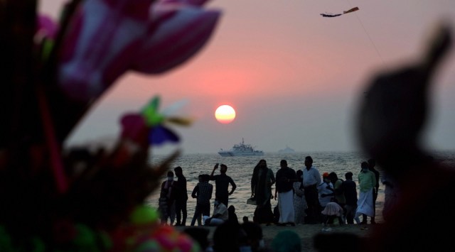 Locals at the seashore during sunset at Beypore in Kozhikode. (PTI Photo/File)