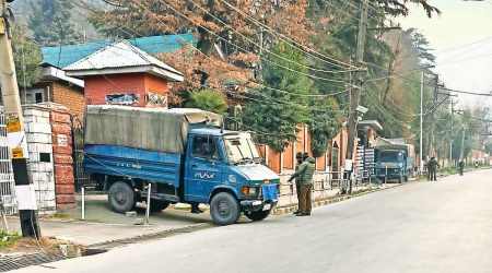 A photograph tweeted by Omar Abdullah on Saturday, showing “trucks parked outside our gates to scuttle” protest.