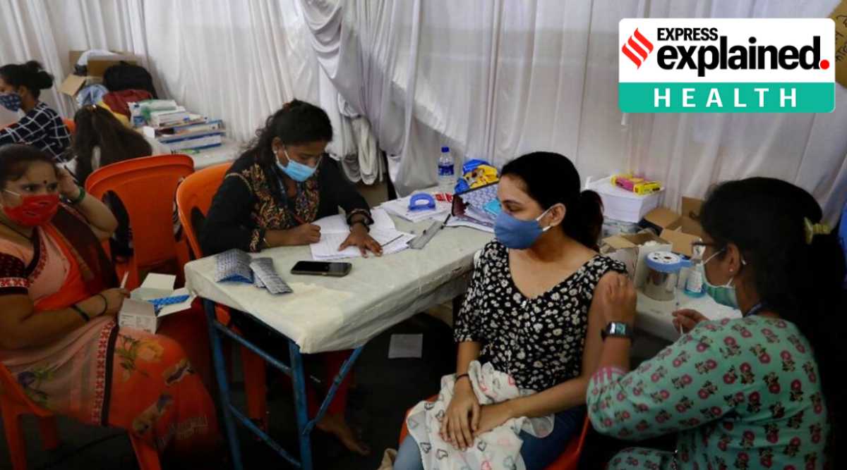 A woman gets a shot of a Covid-19 vaccine. (Express File Photo by Amit Chakravarty)