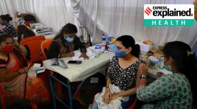 A woman gets a shot of a Covid-19 vaccine. (Express File Photo by Amit Chakravarty)