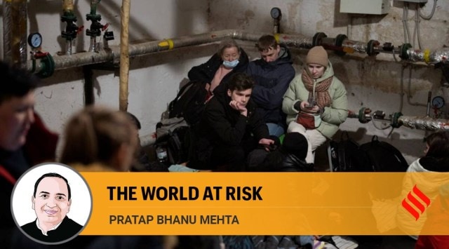 People take shelter at a building basement while the sirens sound announcing new attacks in the city of Kyiv, Ukraine, Friday, Feb. 25, 2022. (AP Photo)