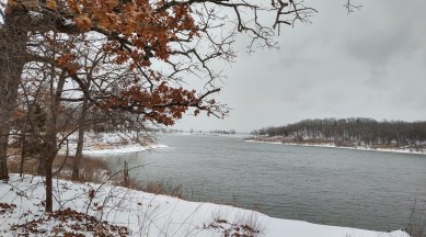 woman floats on air mattress, woman floats above freezing lake, US woman, lake, Oklahoma, indian express