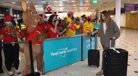 Australia welcomes back tourists, Australia international tourists, Australia koala bears, Australia Tim Tams