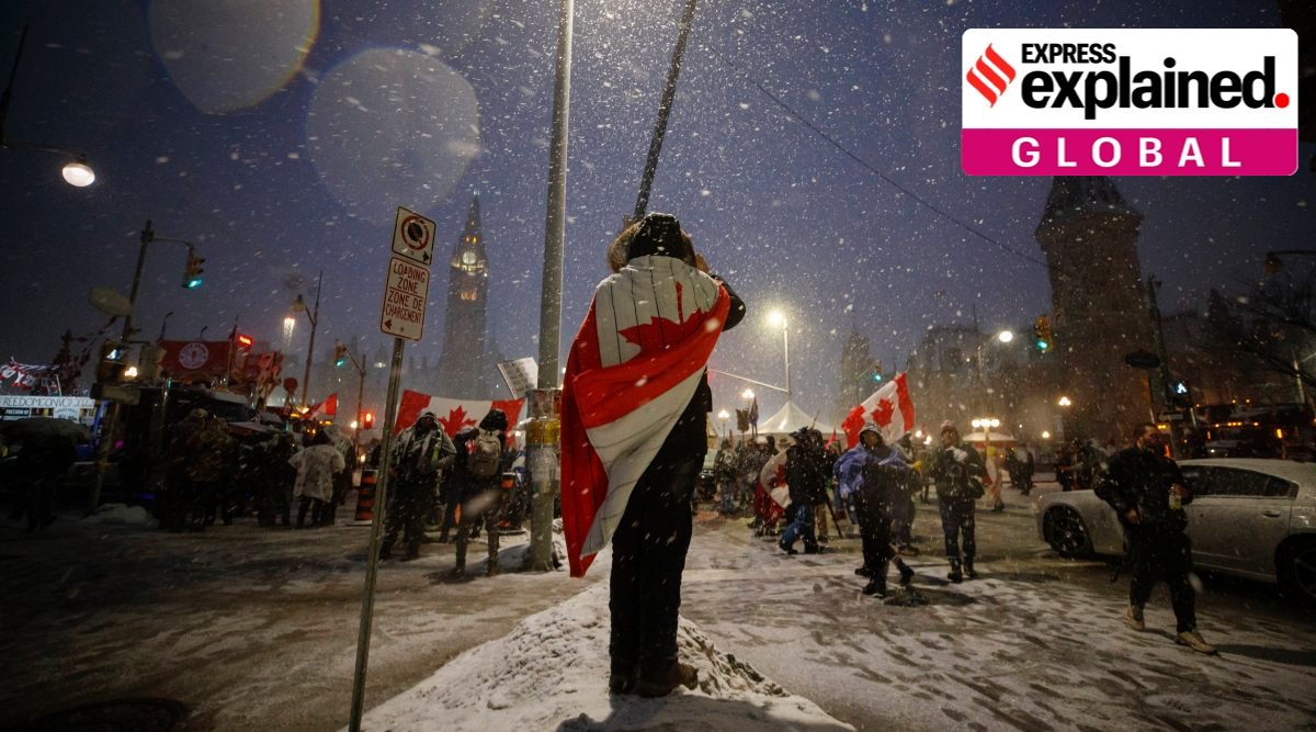 Protesters and supporters gather during a protest against Covid-19 measures in Ottawa  on Thursday, Feb. 17, 2022. (Cole Burston/The Canadian Press via AP)


