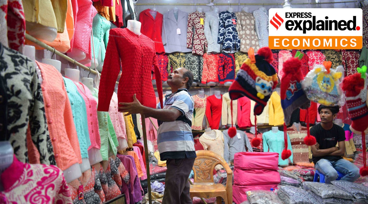 A shopkeeper arranges woollen clothes in Agartala. Price rise in non-food segments, such as clothing, is seen above 6 per cent. (Express Photo: Abhisek Saha)
