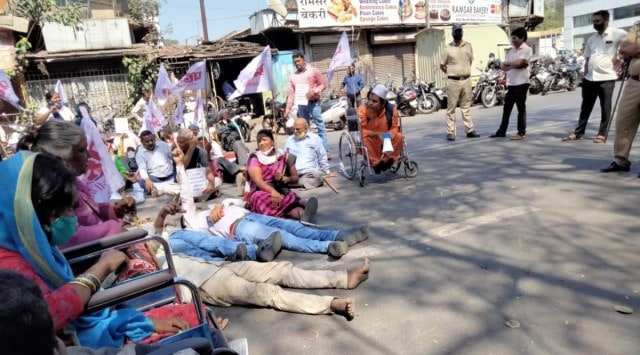 The group is also demanding the construction of a ramp and a lift facility at all government buildings. (Express Photo)