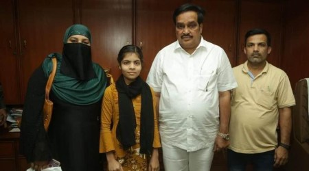 Khushbu with her parents and state BJP chief CR Paatil. (Express Photo)