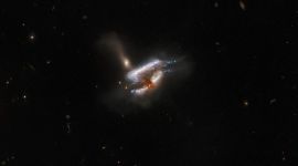 The Hubble Space Telescope has captured an image of the galaxy merger IC 2431 which is happening over 618 million light-years away from the earth in the constellation Cancer, according to the European Space Agency (ESA).