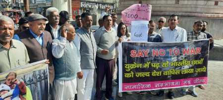 Parents of a group of students, who safely returned to Haryana from Ukraine, and social activists stage a protest in Jind on Sunday against the ongoing Russian invasion of that country (Express Photo)