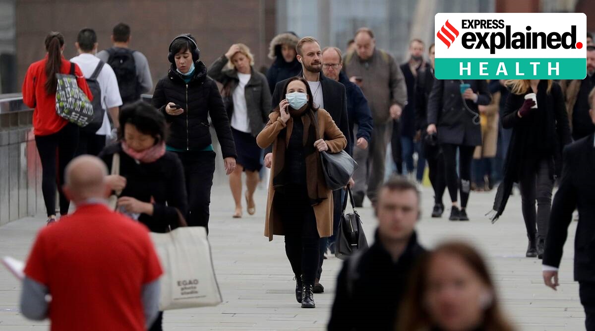 Some experts agree that precautions such as masking should remain in place. (AP)