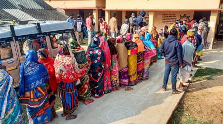 People stand in queues to cast their votes during the first phase of the Panchayat election, in Baleswar, Wednesday, Feb. 16, 2022. (PTI Photo/File)