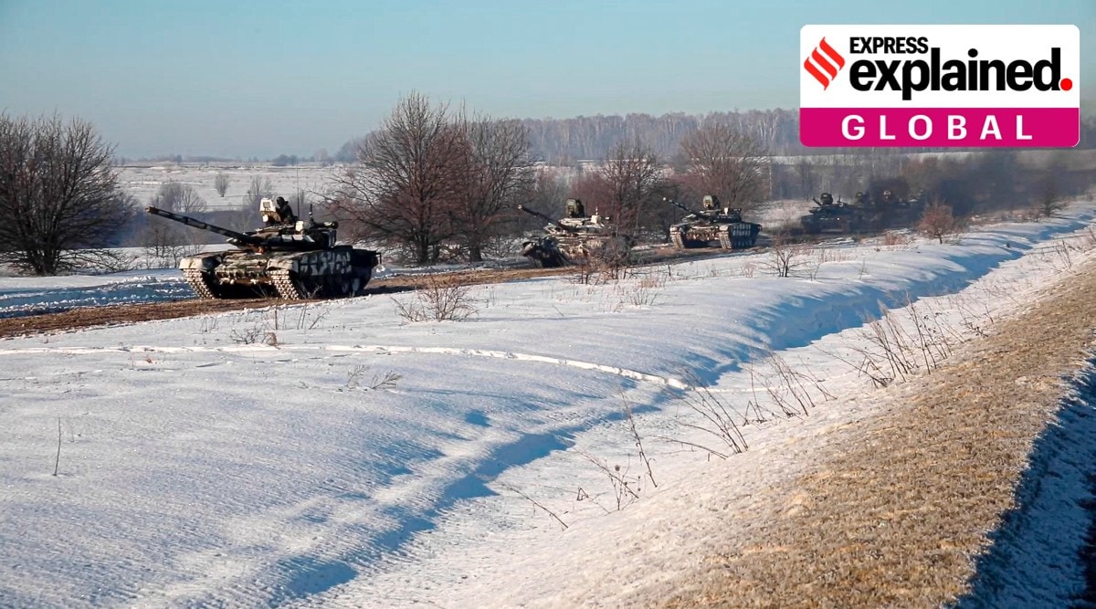 Russian army tanks move back to their permanent base after drills. (Russian Defense Ministry Press Service via AP)


