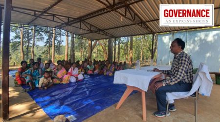 A forest official conducts an awareness programme in Barehipani village. (Express Photo: Aishwarya Mohanty)