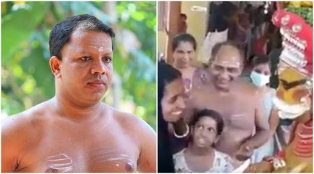 Theyyam artist Sani Peruvannan comforting a Muslim woman at a household in north Kerala's Kasaragod district.