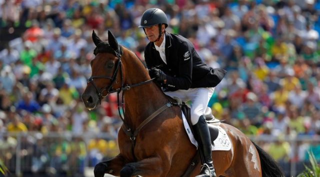 Mark Todd, of New Zealand, riding Leonidas II, competes in the equestrian eventing team show jumping phase at the 2016 Summer Olympics in Rio de Janeiro, Brazil, on Aug. 9, 2016. (AP)