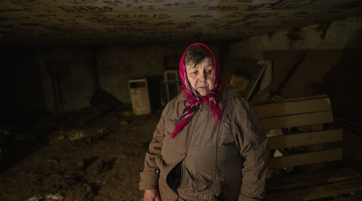 Ukrainians in a shelter beneath a residential building after hearing that separatists had returned to their artillery positions in the village of Vrubivka, Ukraine. (Lynsey Addario/The New York Times) — NO SALES