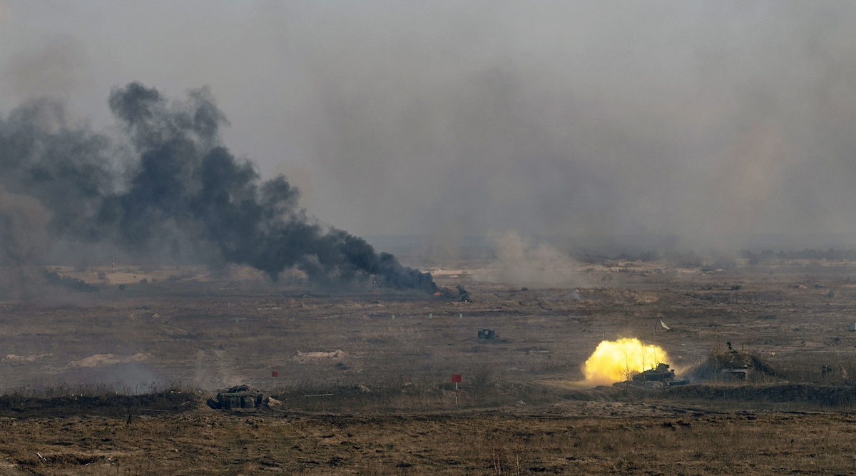 Munitions explode during military exercises February 16, 2022 at a Ukrainian base base near Rivne, about 60 miles from the Belarus border.(Lynsey Addario/The New York Times)