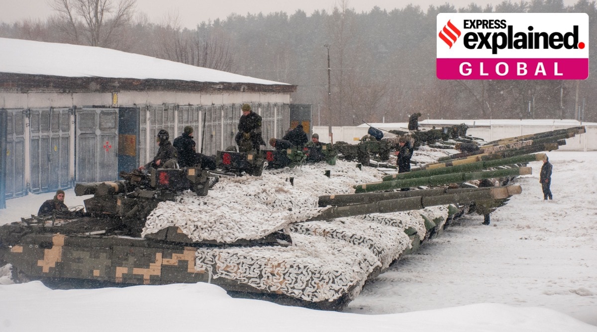Ukrainian soldiers examine their tanks at a military unit close to Kharkiv, Ukraine, Monday, Jan. 31, 2022. (AP Photo/Andrew Marienko)


